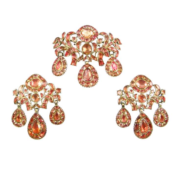 Orange foiled topaz triple drop pendant and pair of earrings en suite